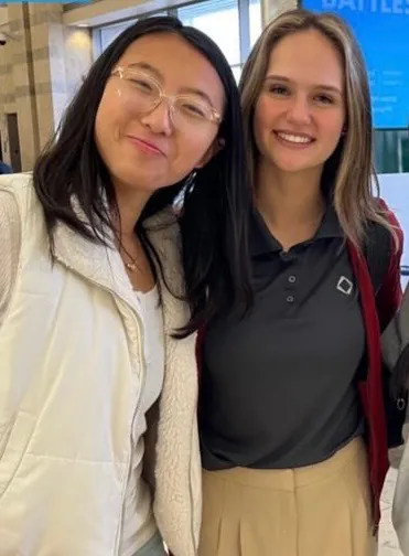 Erika Wu with a DECA event attendee